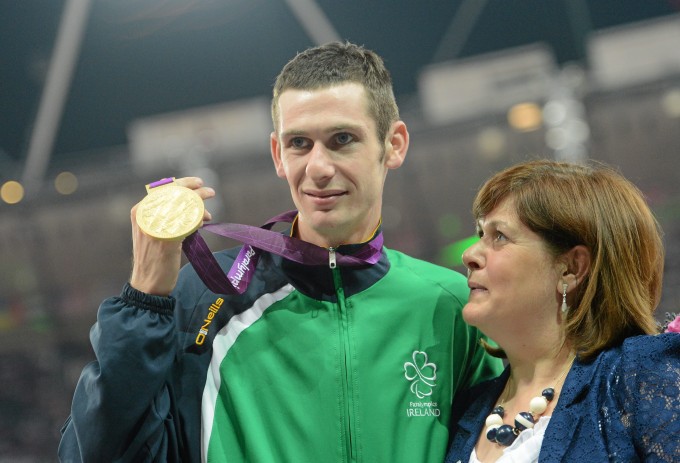 3 September 2012; Ireland's Michael McKillop, from Newtownabbey, Co. Antrim, who was presented with his gold medal by his mother Catherine after winning the men's 1500m - T37 final in a time of 4.08:11. London 2012 Paralympic Games, Athletics, Olympic Stadium, Olympic Park, Stratford, London, England. Picture credit: Brian Lawless / SPORTSFILE